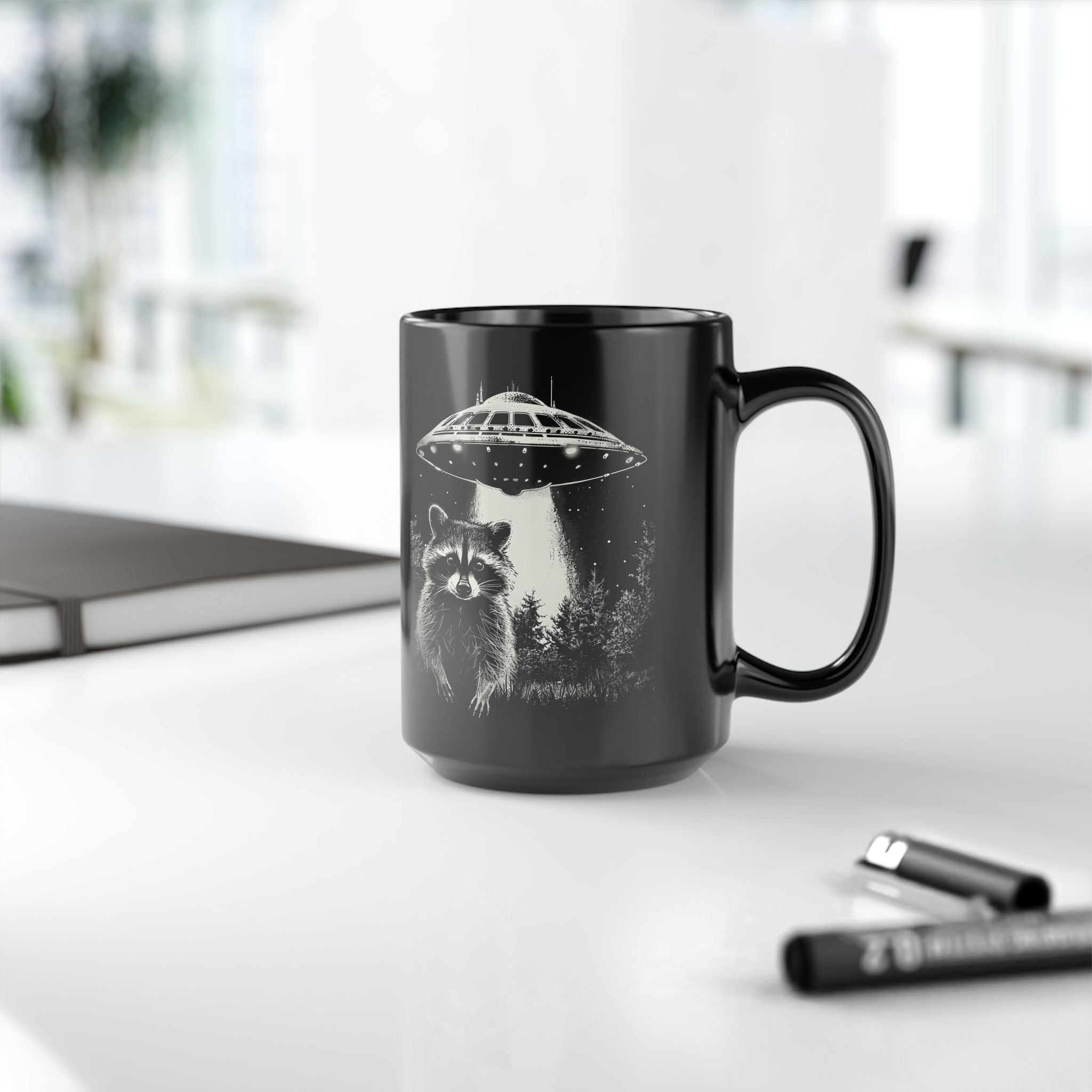 Funny Space Raccoon Mug | Black Ceramic Coffee Cup, 11oz & 15oz | Alien Abduction Parody, Animal Lover Gift, Cosmic Humor Drinkwar